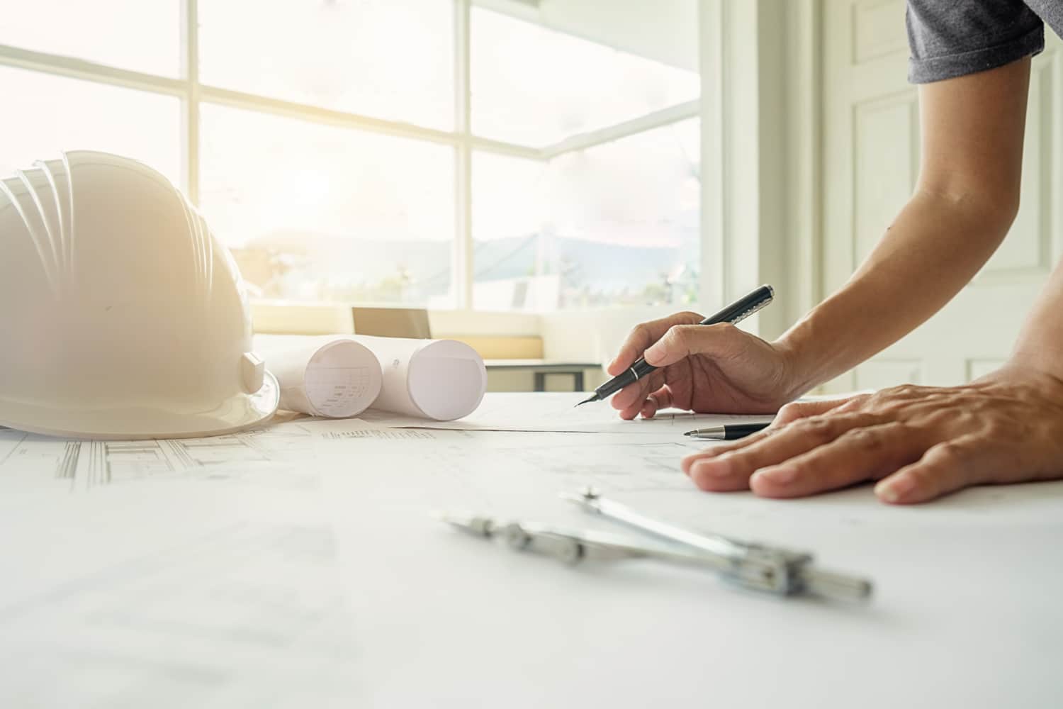 hands engineer working blueprint construction concept engineering tools vintage tone retro filter effect soft focus selective focus